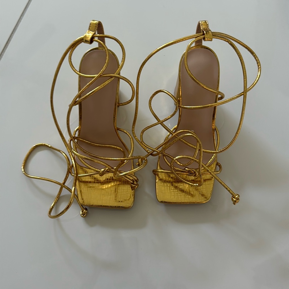 Tie up gold heels
